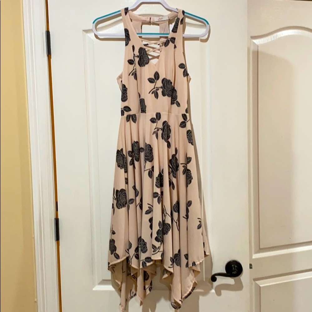 Pink dress with black flowers.